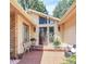 Welcoming front porch with brick flooring and decorative details at 160 Quail Hollow Dr, Kings Mountain, NC 28086