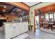 This kitchen offers a breakfast bar and direct access and views to the dining and living areas at 160 Quail Hollow Dr, Kings Mountain, NC 28086