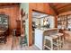 The kitchen features an island with stool seating and seamless access to the dining area at 160 Quail Hollow Dr, Kings Mountain, NC 28086