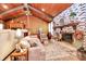Cozy living room with brick fireplace and wood-paneled ceiling at 160 Quail Hollow Dr, Kings Mountain, NC 28086
