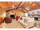 Spacious living room features a vaulted wood ceiling, brick fireplace, and bright natural light at 160 Quail Hollow Dr, Kings Mountain, NC 28086