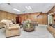 Cozy finished basement with wood paneling and fireplace and lots of room for relaxing at 160 Quail Hollow Dr, Kings Mountain, NC 28086