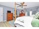 A charming main bedroom with a four poster bed, wood flooring, and elegant furnishings at 160 Quail Hollow Dr, Kings Mountain, NC 28086