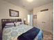Bright bedroom with natural light, neutral walls and a plush bed at 16115 Commodore Dr, Lancaster, SC 29720
