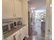 Functional kitchen area features granite countertops, stainless appliances, and ample cabinetry at 16115 Commodore Dr, Lancaster, SC 29720