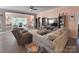 Cozy living room with hardwood floors, ceiling fan, and comfortable seating at 16115 Commodore Dr, Lancaster, SC 29720