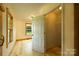 Cozy bedroom with light wood floors, a window, and a walk-in closet for storage at 1640 Bear Poplar Rd, Cleveland, NC 27013