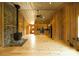 Spacious living area features a wood-burning fireplace, open floor plan, and abundant natural light at 1640 Bear Poplar Rd, Cleveland, NC 27013