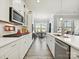 Clean kitchen with white cabinets, countertop and stainless steel appliances at 177 Yellow Birch Loop, Mooresville, NC 28117