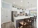 Spacious kitchen with white cabinets, stainless steel appliances, and center island at 177 Yellow Birch Loop, Mooresville, NC 28117