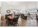 Open-concept living space featuring a dining area, kitchen, and living room at 177 Yellow Birch Loop, Mooresville, NC 28117