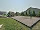 Community playground area with swings, slides, and climbing structures for children at 177 Yellow Birch Loop, Mooresville, NC 28117
