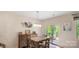 Comfortable dining room with table, chairs, and sliding glass doors to outdoor patio at 2009 Trindle Vine Ln, Waxhaw, NC 28173