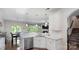 Kitchen features stainless steel appliances, quartz countertops, and an open layout at 2009 Trindle Vine Ln, Waxhaw, NC 28173
