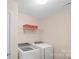 Laundry room with modern washer and dryer at 2009 Trindle Vine Ln, Waxhaw, NC 28173