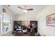Office with built-in shelves, hardwood floors, and natural light at 2009 Trindle Vine Ln, Waxhaw, NC 28173