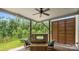 Cozy outdoor lounge area with comfortable seating, fireplace, and natural views perfect for relaxing at 2009 Trindle Vine Ln, Waxhaw, NC 28173