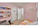 A cozy room featuring a book shelf, sweet dreams decor and a rainbow patterned bed at 210 Clove Hitch Dr, Salisbury, NC 28677