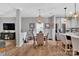 Elegant dining area with stylish light fixture and view into kitchen and living area at 210 Clove Hitch Dr, Salisbury, NC 28677