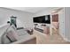 Comfortable living room with cozy sofa and modern entertainment center at 210 Clove Hitch Dr, Salisbury, NC 28677