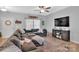 Spacious living room with a large sectional sofa and modern decor at 210 Clove Hitch Dr, Salisbury, NC 28677