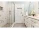 Modern bathroom featuring a glass shower, and a double vanity at 2159 Quiet Cove Ln, Stanfield, NC 28163