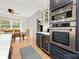 Modern kitchen features built-in stainless steel appliances and a bright breakfast nook at 2159 Quiet Cove Ln, Stanfield, NC 28163