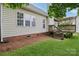 Charming backyard with deck, pergola, and well-maintained lawn at 2321 Oberwood Dr, Charlotte, NC 28270