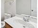 Well-lit bathroom featuring a single sink vanity with chrome fixtures and white countertop at 2321 Oberwood Dr, Charlotte, NC 28270
