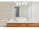 Bathroom featuring a double sink vanity with granite countertop and a large mirror at 2321 Oberwood Dr, Charlotte, NC 28270