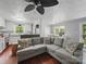 Spacious living room with hardwood floors connects to the kitchen and dining area at 2345 Stallings Rd, Matthews, NC 28104