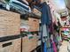 Organized walk-in closet features shelving, woven baskets, hanging clothes, and ample storage at 2345 Stallings Rd, Matthews, NC 28104