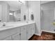 Bright bathroom with double sink vanity, large mirror, and walk in shower at 2467 Hawk Ridge Dr, Gastonia, NC 28056