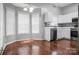 Inviting breakfast nook with a modern kitchen featuring stainless steel appliances and white cabinets at 2467 Hawk Ridge Dr, Gastonia, NC 28056