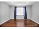 Bedroom featuring hardwood floors, lots of natural light, and neutral paint at 2467 Hawk Ridge Dr, Gastonia, NC 28056