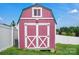 Back of shed with a security camera on the back side at 2467 Hawk Ridge Dr, Gastonia, NC 28056