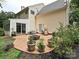A beautiful backyard patio featuring ample greenery, perfect for outdoor entertaining at 2848 Huckleberry Hill Dr, Fort Mill, SC 29715