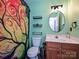 Bright bathroom with modern fixtures, colorful shower curtain, and stylish decor at 2848 Huckleberry Hill Dr, Fort Mill, SC 29715