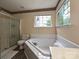 Bathroom featuring a large tub and walk in shower at 2848 Huckleberry Hill Dr, Fort Mill, SC 29715