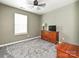 Bedroom featuring a dresser and a window at 2848 Huckleberry Hill Dr, Fort Mill, SC 29715