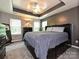 Spacious bedroom featuring a large bed with storage and soft natural light from multiple windows at 2848 Huckleberry Hill Dr, Fort Mill, SC 29715