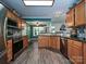 Spacious kitchen featuring stainless steel appliances, wood cabinetry and an open layout at 2848 Huckleberry Hill Dr, Fort Mill, SC 29715