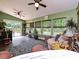 Comfortable living space featuring a vaulted ceiling, ceiling fans, and lots of natural light at 2848 Huckleberry Hill Dr, Fort Mill, SC 29715