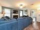 Cozy living room with fireplace, large windows, and comfortable seating at 2848 Huckleberry Hill Dr, Fort Mill, SC 29715