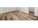 Bedroom showcases wood-look flooring with a view to the ensuite at 3133 Amay James Ave, Charlotte, NC 28208