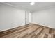 Clean bedroom with new wood flooring and fresh paint at 3133 Amay James Ave, Charlotte, NC 28208