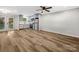 Open concept space with stainless steel appliances and a view to the back yard at 3133 Amay James Ave, Charlotte, NC 28208