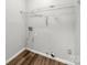 Laundry room featuring white wire rack shelving and connections for washer and dryer at 3133 Amay James Ave, Charlotte, NC 28208