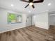 Bright living area featuring new flooring, fresh paint and great natural light at 3133 Amay James Ave, Charlotte, NC 28208
