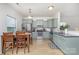 Well-equipped kitchen with updated appliances, granite counters, and a breakfast nook perfect for Gathering meals at 3304 Saddlebrook Dr, Midland, NC 28107